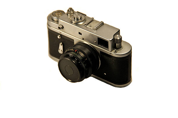 istock Retro photo camera isolated on white background 636247406