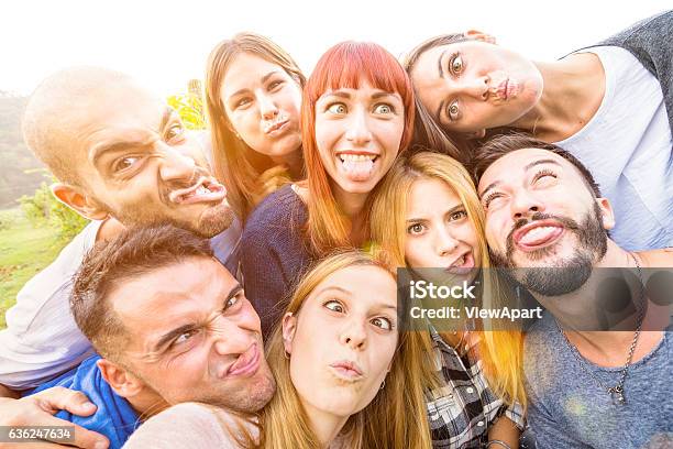 Happy Best Friends Taking Fun Selfie Outdoor With Back Lighting Stock Photo - Download Image Now