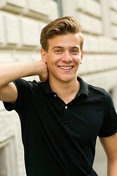 istock Smiling teenage boy looking at camera. 636249244