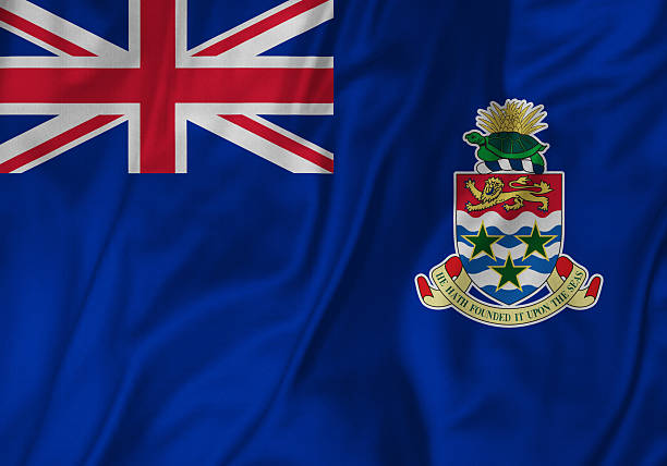 close-up de ruffled cayman islands flag, bandeira das ilhas cayman soprando ao vento - caimão - fotografias e filmes do acervo