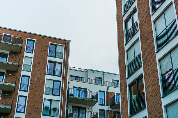 istock orange facaded brick buildings in modern style 636253576