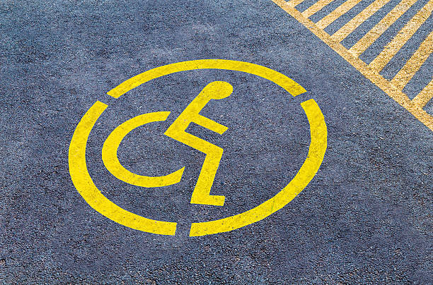 istock Handicap parking sign on asphalt, persons with disabilities 636255682