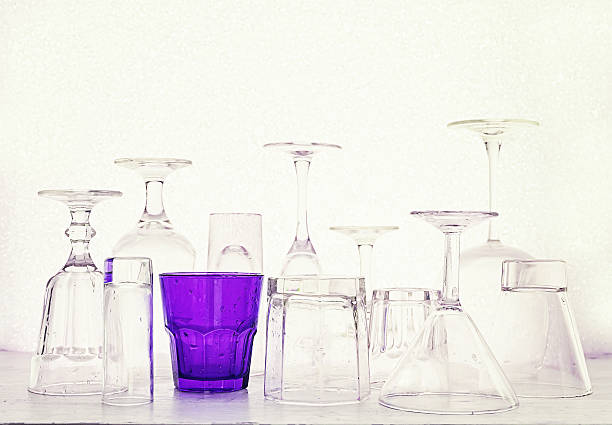 Glass goblets of different shapes on a white background