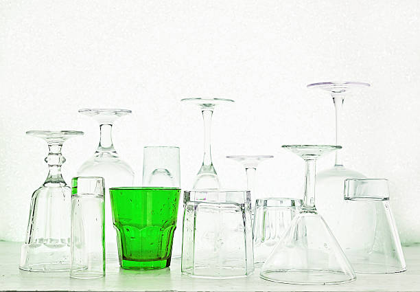 istock Glass goblets of different shapes on a white background 636256940