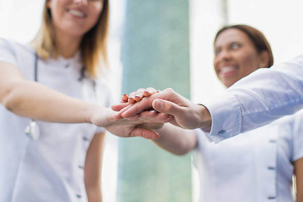istock Young medical team having discussion outdoors 636257438
