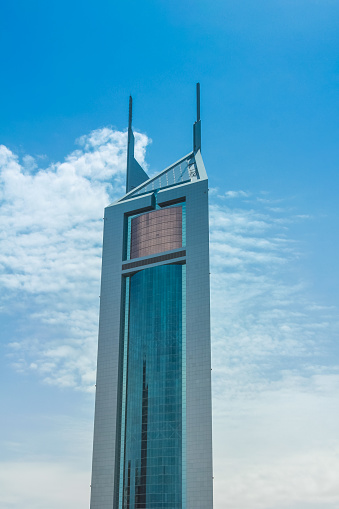 Dubai, United Arab Emirates - May 1, 2013: close up of Emirates Office Tower, also known as Emirates Tower One, is a 54-floor office building along Sheikh Zayed Road in Dubai in Downtown of Dubai.