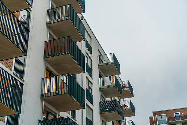 istock modern steel balconies on white facaded apartment house 636257830