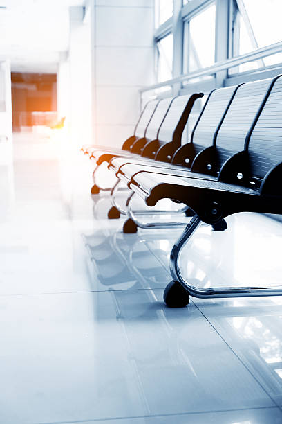 istock Empty chairs in a hospital hallway 636258834