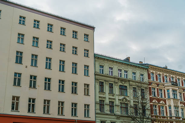 istock modern and old houses in a row 636259482