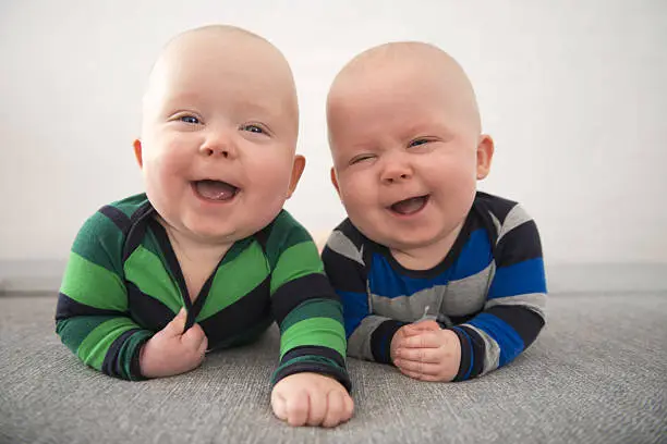 Photo of Identical twins laughing