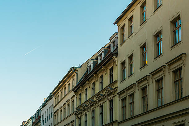 istock beautiful yellow row houses in clean style 636262148