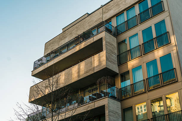 istock beautiful and modern architecture with blue windows 636262878