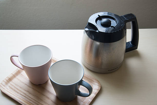 pair of mug and coffee pot