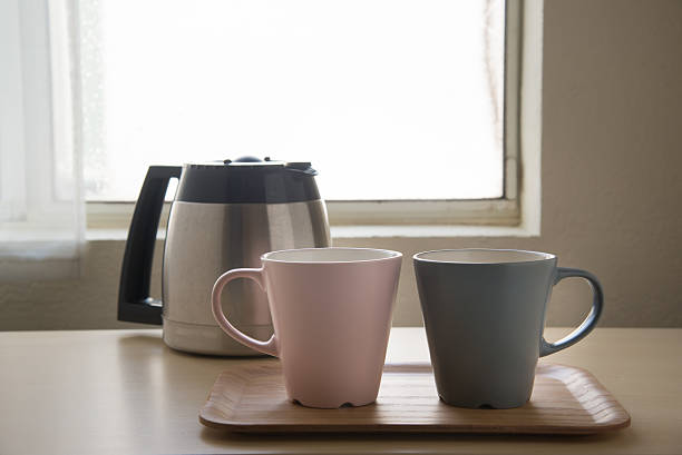 istock pair of mug and coffee pot 636263766