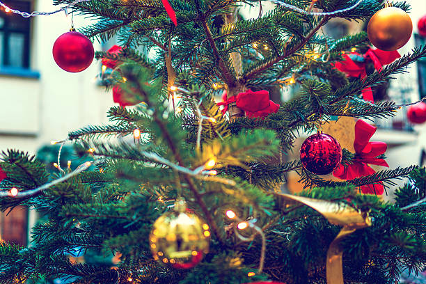 istock Christmas tree at shopping street in berlin 636264370
