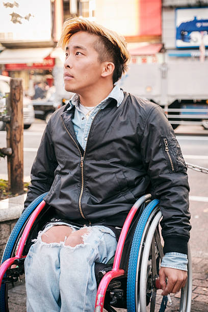 istock Japanese Man in Wheelchair 636264668