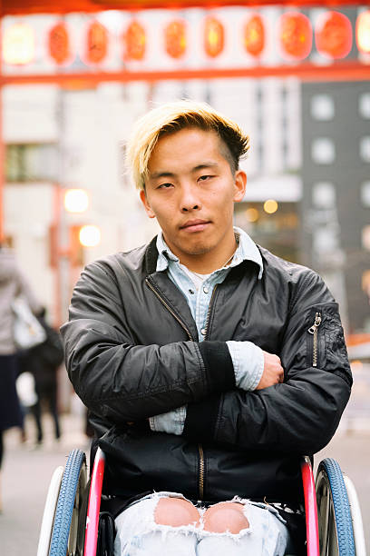 istock Japanese Man in Wheelchair 636264680