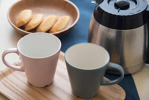 istock pair of mug and coffee pot 636265292