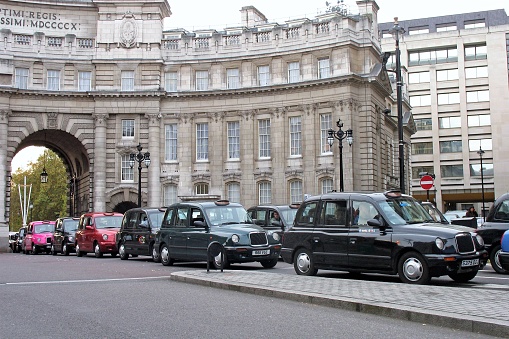 London, United Kingdom - November 10th, 2006: LTI TX4 (London Taxi Company) taxi vehicles on the street. The LTI TX4 is the most popular taxi vehicle in UK.