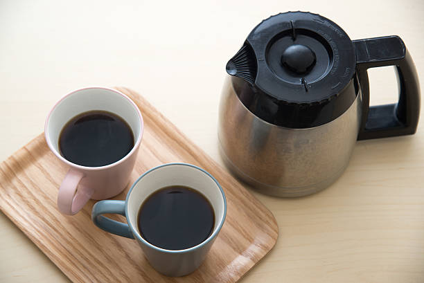 istock pair of mug and coffee pot 636265470