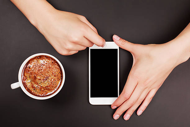 Woman using a touch screen of smart phone