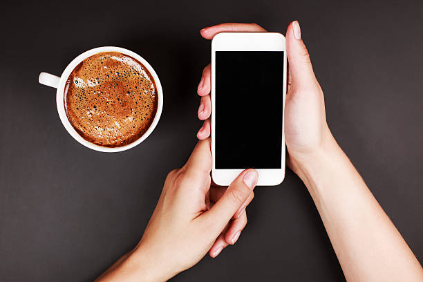 Woman using a touch screen of smart phone