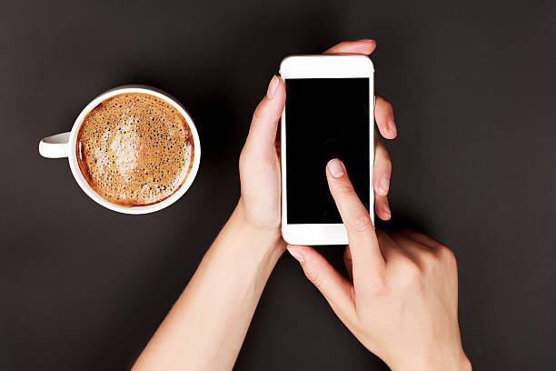 Woman using a touch screen of smart phone