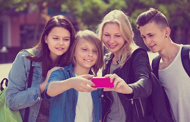 istock Teenagers doing selfie outdoors 636267736