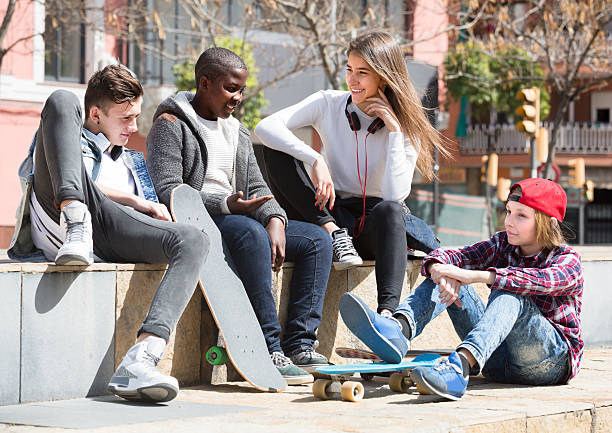 istock teens  spending time togethe in sunny day 636268020
