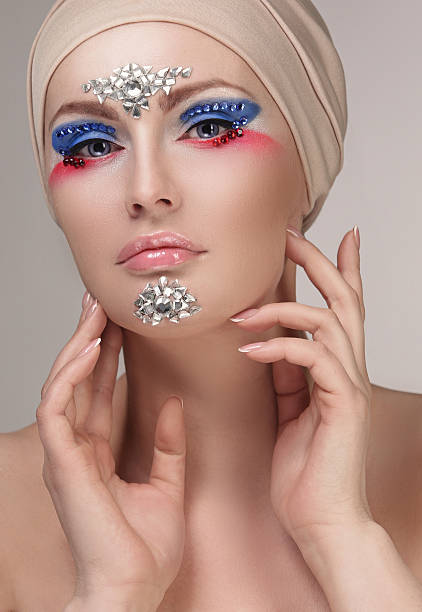 istock Model with makeup and jewelry, rhinestones 636268332