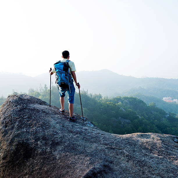 istock Male hiker standing on a rock 636269548