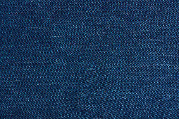 texture jeans blu scuro da vicino - denim foto e immagini stock