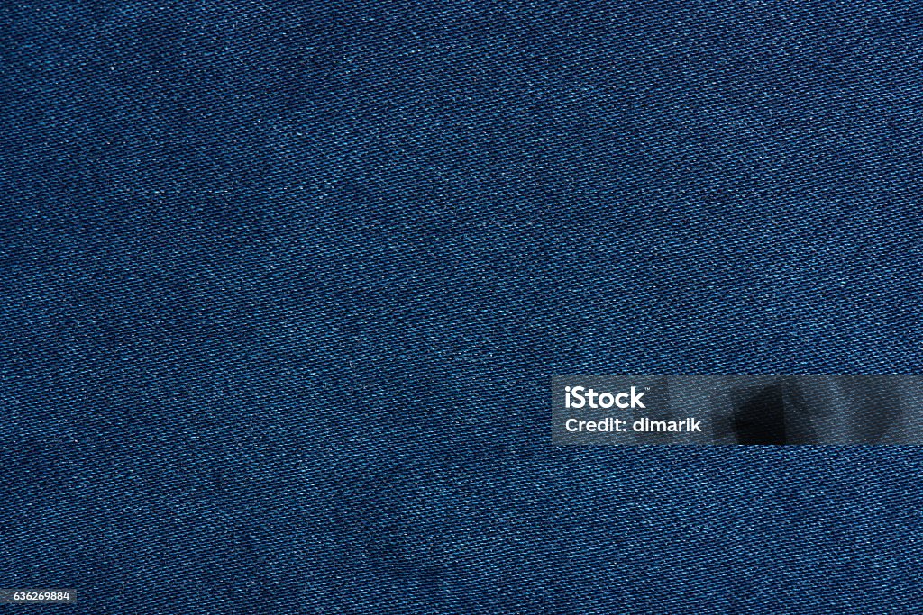 Dark blue jeans texture close up Dark blue jeans texture close up with horizontal thread lines Denim Stock Photo