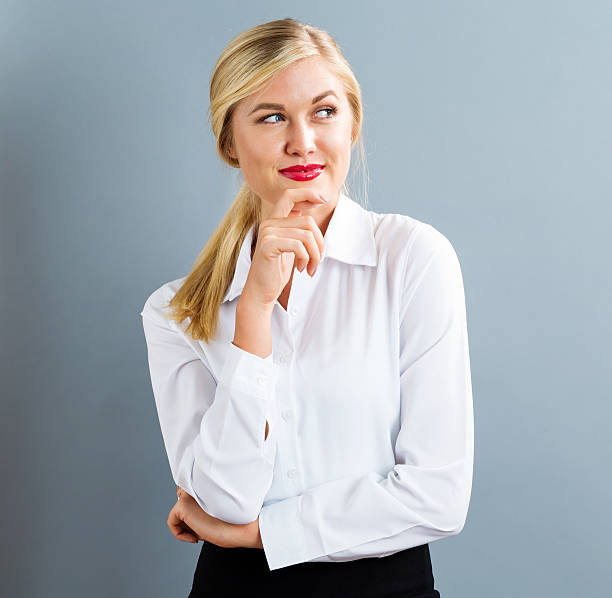 istock Young businesswoman in a thoughtful pose 636270240