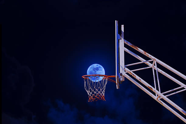 istock moon in a basketball hoop. 636270300