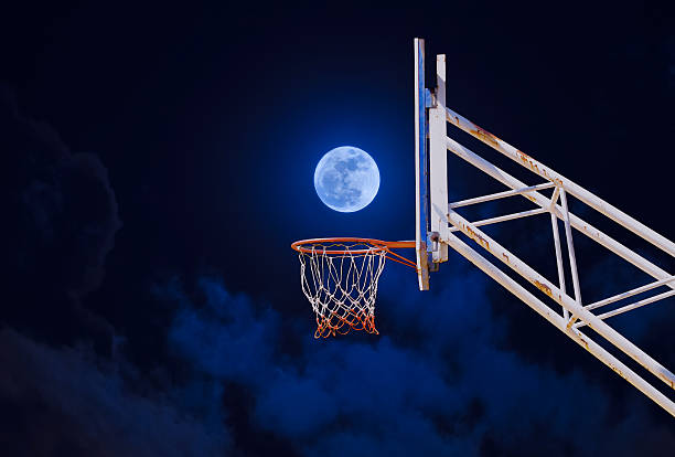 istock moon in a basketball hoop. 636270334