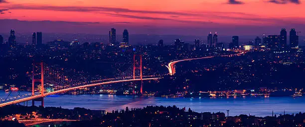 The Bosphorus Bridge in Istanbul at night, Turkey. The Bosphorus Bridge connecting Europe and Asia.