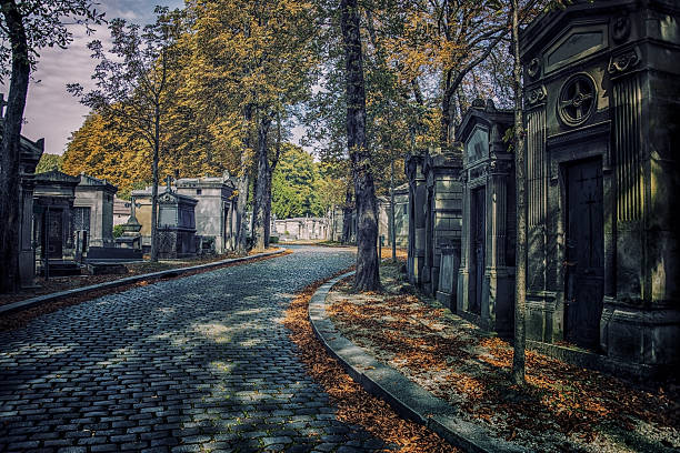 Pere-Lachaise cemetery in Paris Fall in Pere-Lachaise cemetery  mausoleum stock pictures, royalty-free photos & images