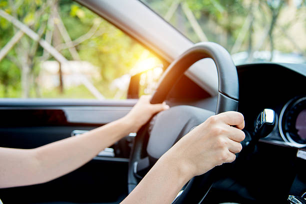 istock Woman hand driving 636279150