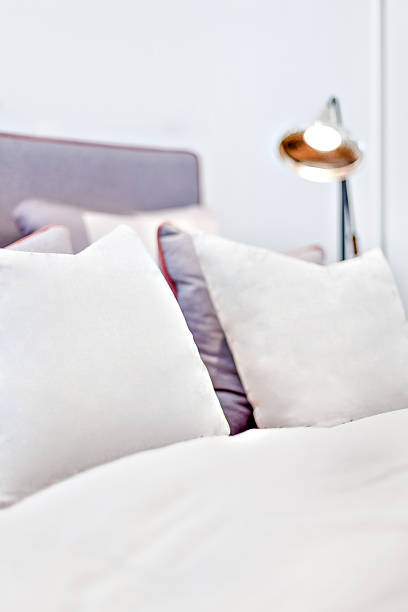 istock Pillows and blanket with the white color close up 636287196