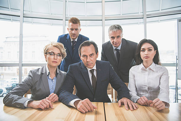 istock Serious people are looking straight 636289940