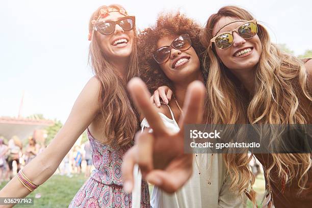 Peace Sign And Three Friends Stock Photo - Download Image Now - Music Festival, Traditional Festival, Music