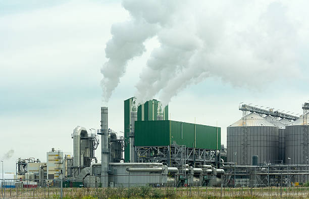 istock industial smoke  escaping from chemical plant chimneys 636297194