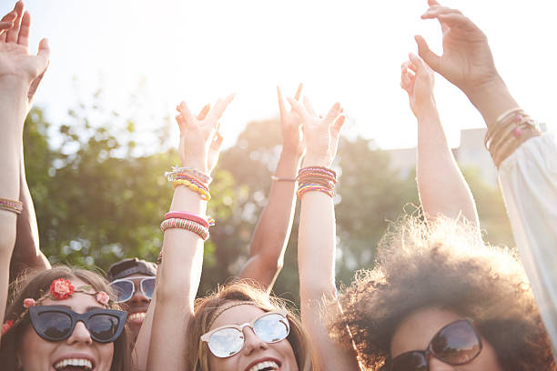istock Group of people with their hands raised 636298138