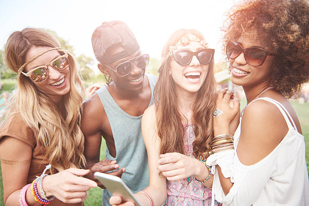 istock Looking at photos in the phone 636298436