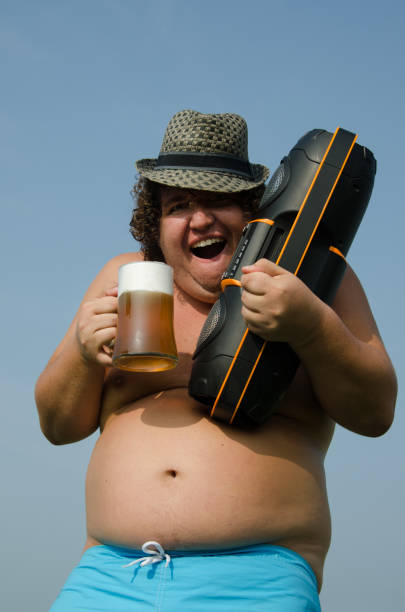 istock Party. Drunk man with a boombox and beer. 636299148