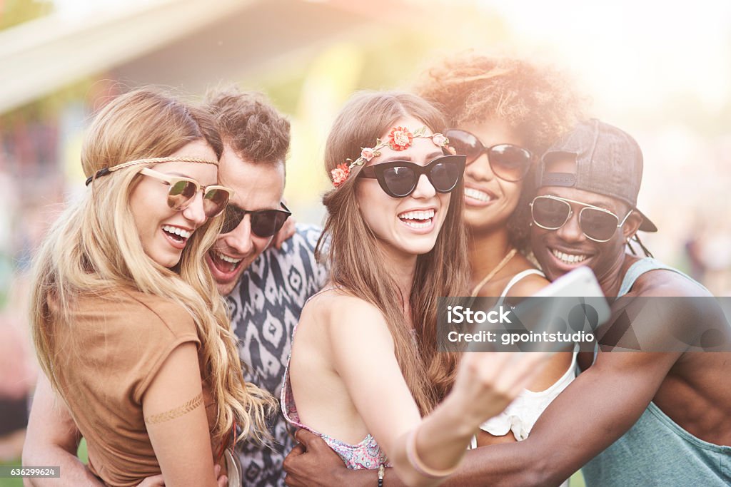 Can we take a selfie first Music Festival Stock Photo