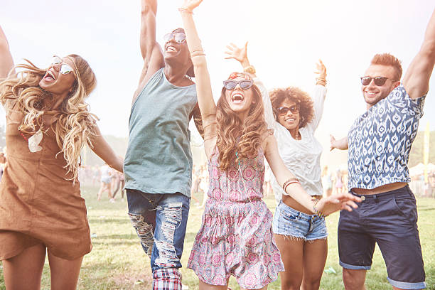 istock Everybody jumping and raising hands 636300124