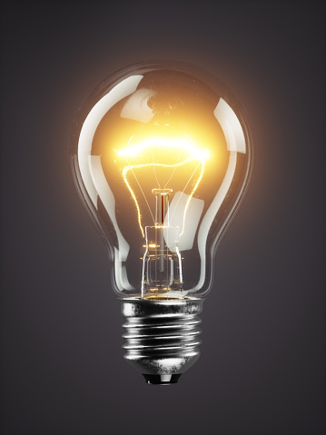 Low glowing electric bulb lamp on dark background 3d