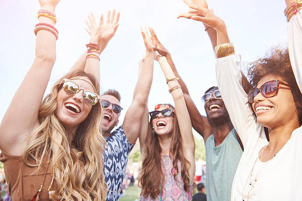 istock Everybody raising hands higher to the sky 636301210